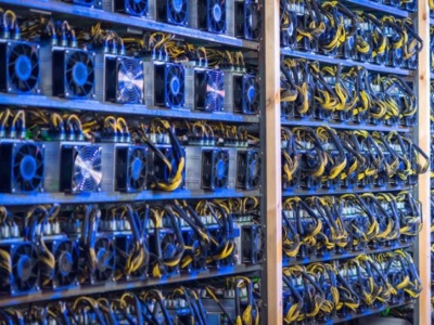A mining farm with rows of mining rigs signifies the importance of a reliable environment.