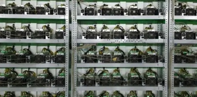 A large scale mining farm with rows of mining rigs.